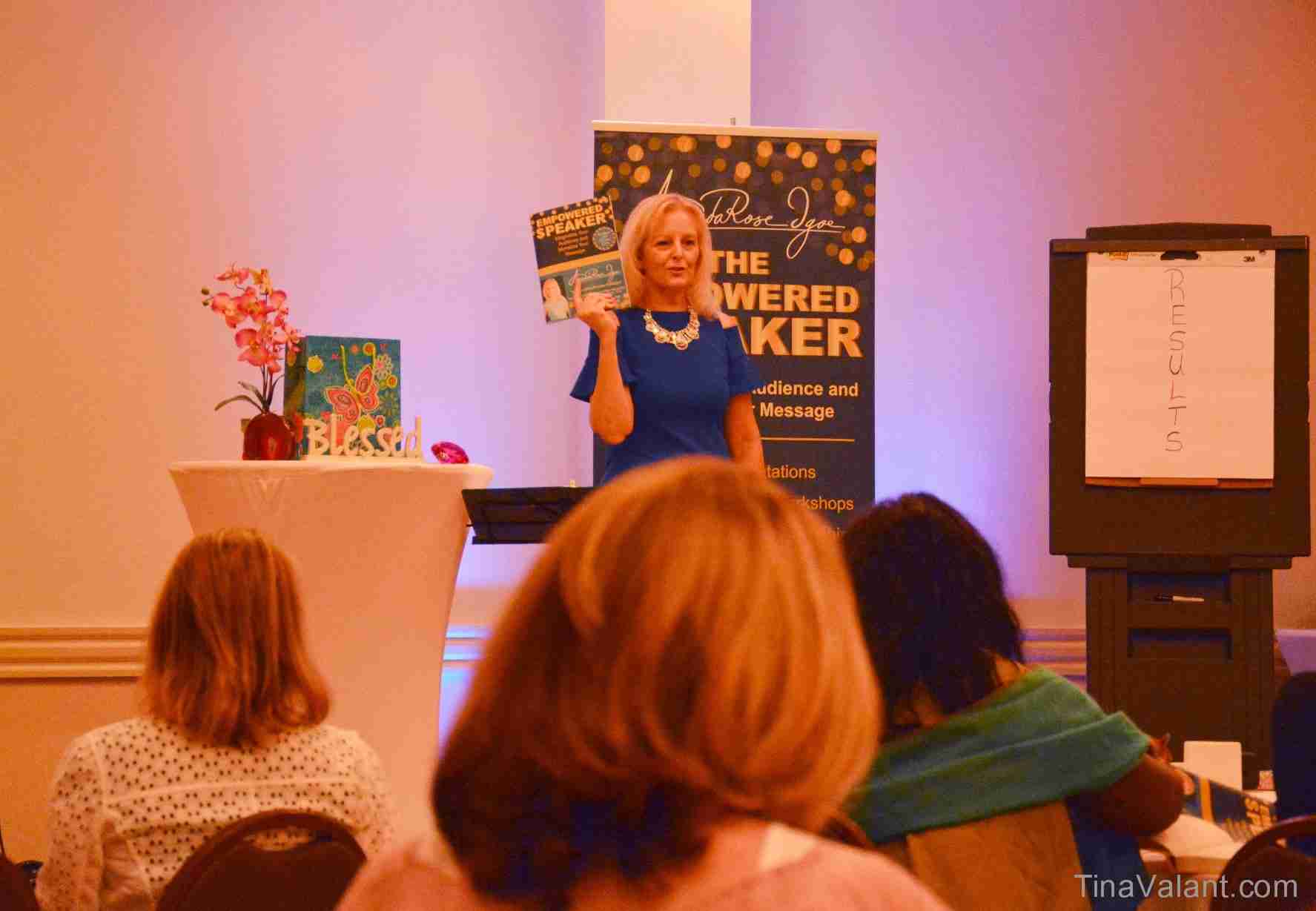 Speech coach AmondaRose Igoe on stage, 7-Step Process on How to Get Speaking Engagements that Help You To Grow as a Speaker